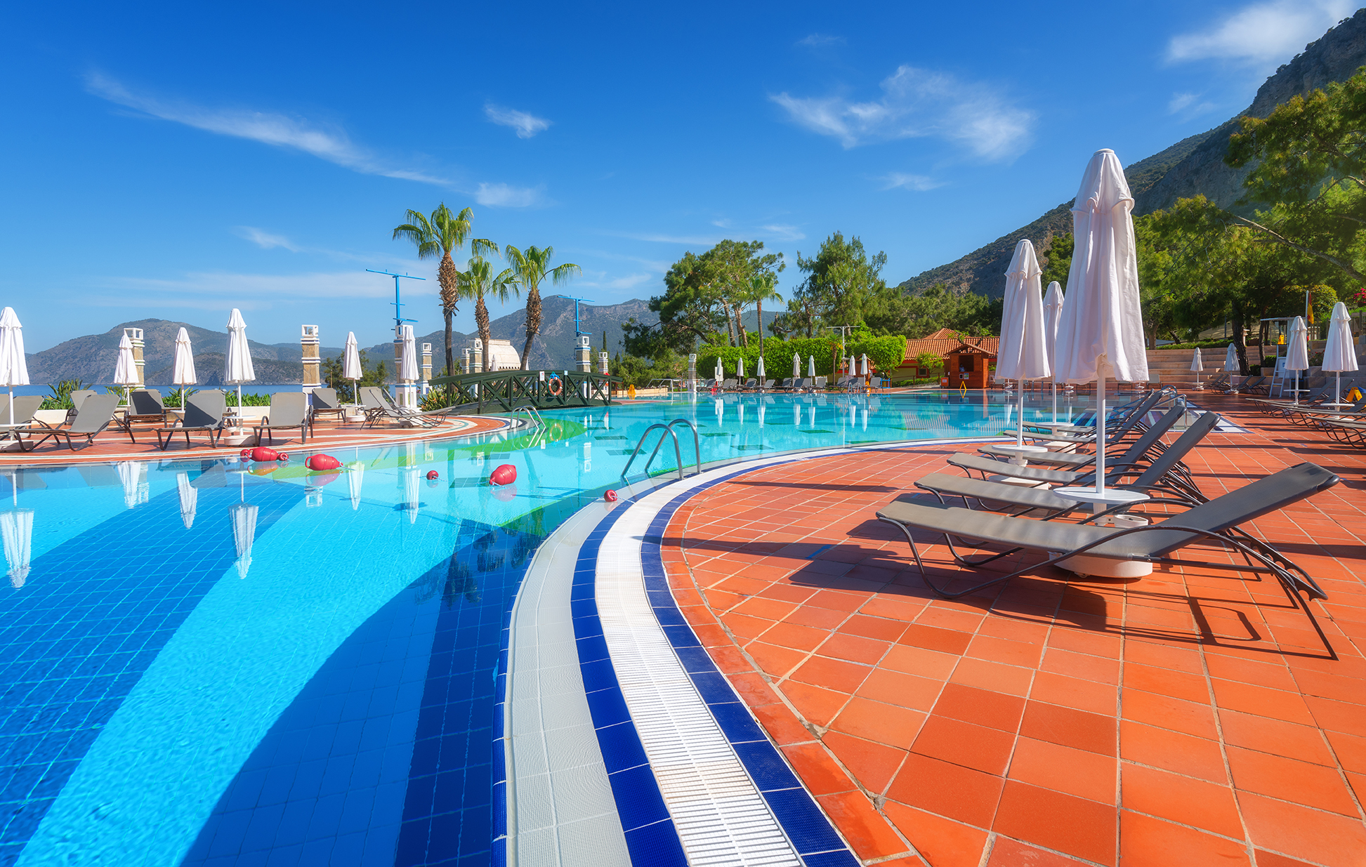 beautiful swimming pool with sun beds and umbrella 2024 12 02 14 25 45 utc 1