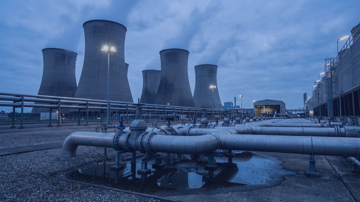Industrial cooling towers with discharge piping at a large computing facility
