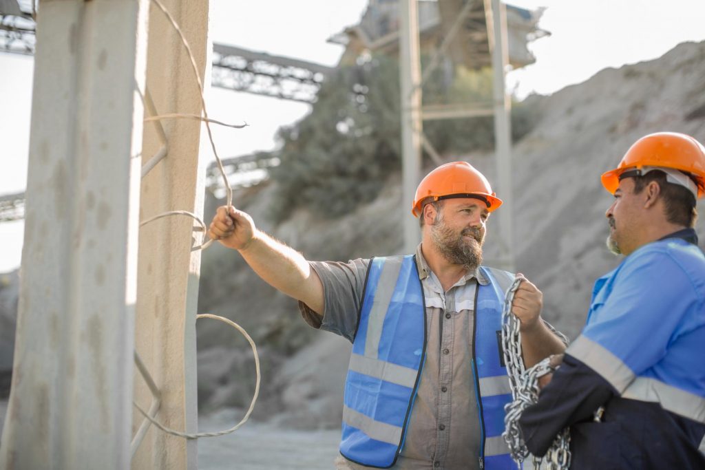 Two Quarry Workers In Quarry Having Discussion 2022 03 04 01 55 07 Utc